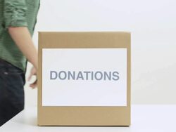 People placing food in donations box Stock Footage