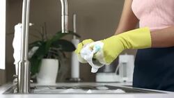 HD: Woman Doing The Dishes Stock Footage