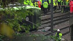 Emergency Workers At Scene of Tram Derailment News Clip