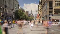 Tourists walk through Wenceslas Square in Prague's City Centre. Stock Footage