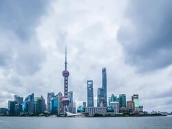 Time Lapse - Shanghai Skyline at Dusk (Zoom In) Stock Footage