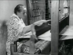 B/W 1934 woman using loom in WPA weaving project / documentary Stock Footage