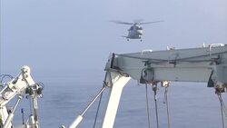 Rescue helicopter landing on HMS Bulwark  City Name News Clip