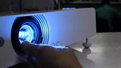 Adjust focus a projector Stock Footage