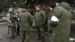 CLEAN : Buses take civilians from Ukraine town after truce agreed News Clip