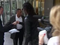 Russell Brand signs for fans while promoting his new book 'Revolution' at SiriusXM Satellite Radio in New York Stock Footage