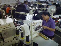 Workers at a Beijing Rontex Garment Factory News Clip