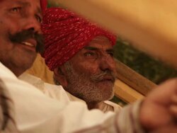 Two rajasthani senior men talking, Jaisalmer, Rajasthan, India Stock Footage