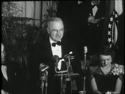 U.S. President Harry S. Truman makes a speech at a victory party after winning the presidential election. News Clip
