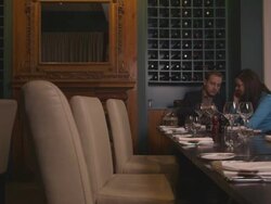 MS PAN Young couple drinking water in restaurant Stock Footage