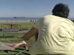  MS Five students on spinning merry go round with one male student pretending to surf whilst standing / Cape Town, Western Cape, South Africa Stock Footage