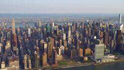 WS AERIAL POV View of modern skyscrapers in downtown with Empire State Building / Midtown Manhattan, New York City, New York State, United States Stock Footage