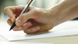 Woman's hand writing Stock Footage