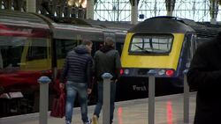 Passengers and trains at Paddington platforms News Clip