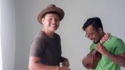 HD DOLLY : Man play Ukulele Stock Footage