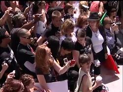 Dancers and fans alike crowded around Michael Jackson's star on the Hollywood Walk of Fame to remember the pop star on the anniversary of his death News Clip