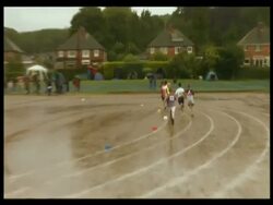 Children's running events: boys and girls competing at Wenlock and Olympian Games, UK. 2007; short sequence. Stock Footage