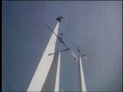 1964 low angle slight point of view around weathervanes on top of tall columns at NY World's Fair Stock Footage