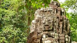 Stone Gate of Angkor Temple at Angkor Thom in Cambodia Stock Footage