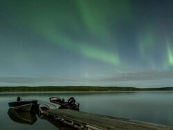 WS T/L View of aurora during early summer with boats and dock / Yellowknife, Northwest Territories, Canada  Stock Footage
