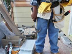 MS TU Boy (8-9) holding hard hat / Los Angeles, California, USA Stock Footage