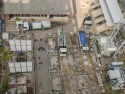 HD Time-lapse: Aerial view of working truck in electrical Construction site Stock Footage
