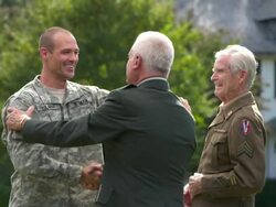 MS Father and Granfather in Uniform Greeting Soldier Son Returning Home from Military Service / Richmond, Virginia, United States Stock Footage