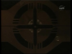 NASA checking shuttle Discovery's left wing, where sensors picked up impact News Clip