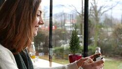 Teen girl texting on cell phone Stock Footage