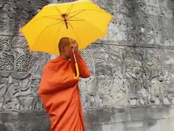Cambodian monk at the Bayon Cambodia Stock Footage