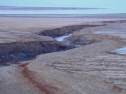 AERIAL WS TS View of muddy surface of dead sea in desert / Sourn Judea Desert, Israel  Stock Footage