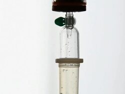 HD IV Dripper in Sick Room Macro Pan & Tilt Stock Footage