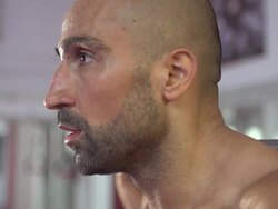 Man doing squats CrossFit workout at the gym.  - Slow Motion - 1920x1080 - filmed at 200 fps Stock Footage