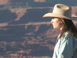 MS ZO Women with Horses over looking spectaculair Red Rock Canyonss, Majestic Western Landscapes / Telluride, Colorado, United States   Stock Footage