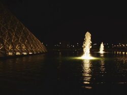 MS Louvre pyramid at night with fountains / Paris, France Stock Footage