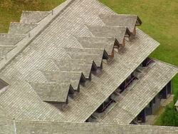 WS AERIAL PAN View of Von Trappe Family Lodge surrounded by tree / Vermont, United States Stock Footage