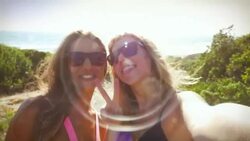 Surfer girls taking a selfie Stock Footage