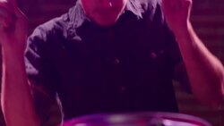 A drummer plays on a glitter covered drum kit. Stock Footage
