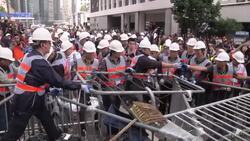 Authorities start clearing barricades from pro-democracy camp, reax News Clip