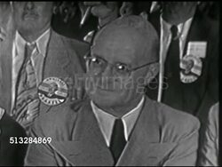 1952: DELEGATES IN CHICAGO: MS Clint Tonotle, SOT reporting from Conrad Hilton Hotel in Chicago, PAN to seated delegates, MS Colonel Jack M. Arvey, Illnois Democratic national committeeman, sitting w/ others. Instructional Video