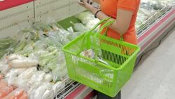 Women shopping fruits and vegetables in supermarket Stock Footage