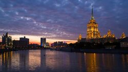 Russia, Moscow, Moskva river, Hotel Ukraine - one of the seven sister skyscrapers, built in Moscow at the end of Stalin's reign (early 1950s) - Time lapse Stock Footage