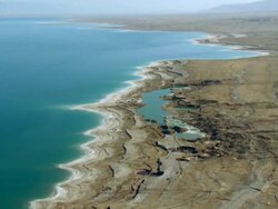 WS AERIAL ZI Sinkholes formed by continuing sea level drop near  dead sea /  Norrn Judea Desert, Israel Stock Footage