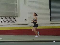 MS POV Girl jogging with ipod and earphone on pathway /New York, New York, United States Stock Footage