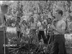 1952: LANEBURG HIGH SCHOOL FOREST: VS Forester Dick Shelton instructing Laneburg H.S. students how best to prevent forest fires, students raking dust around brush, Delton talking about best method of burning brushes (SOT), setting brush on fire. Instructional Video
