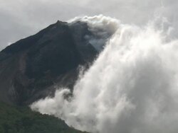 Clouds and steam swirl around flanks of Merapi volcano; Central Java, Indonesia. 29 October 2010 Stock Footage