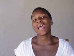 African woman laughing, looking at the camera Stock Footage