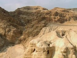 WS T/L View of caves of Qumran near Dead sea / Qumran,  Judea Desert,  Isarel Stock Footage