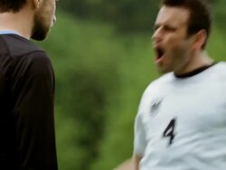 MS R/F professional soccer player celebrating goal in front of opposing player Stock Footage