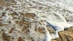 Years 2016 and 2017 erased by sea waves Stock Footage